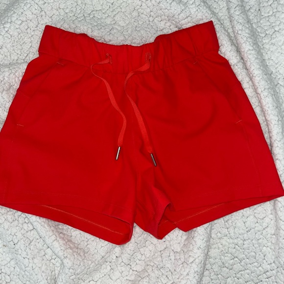 Lululemon bright red on the fly mid rise shorts - Picture 2 of 9